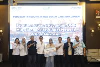Berfoto bersama setelah pelaksanaan kegiatan Pelatihan Literasi Keuangan bagi UMK binaan. 
