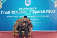 Mendiang KH. M. Arif Marzuki. Foto: FB Pesantren Darul Istiqamah Pusat Official